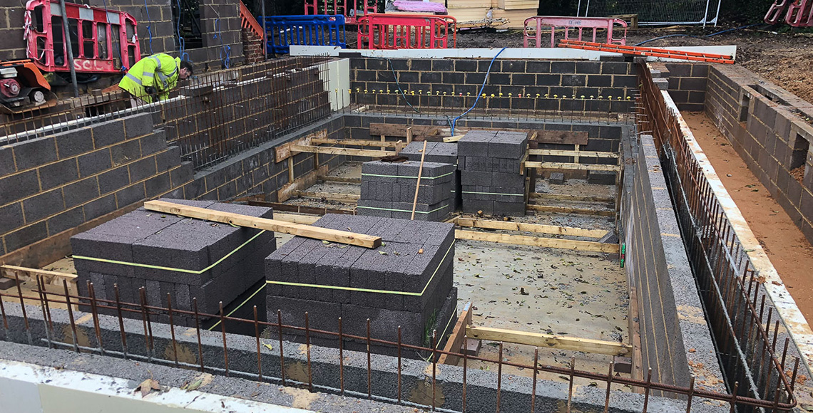 An old gym building and pool under construction in the New Forest National Park area being renovated by INKSPACE Architects and Interior Designers