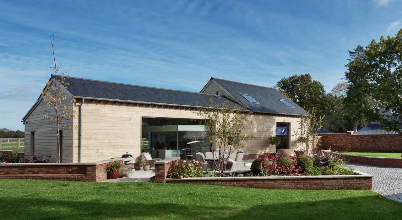 Ellingham Barns exterior view of barn conversion by Inkspace Architecture